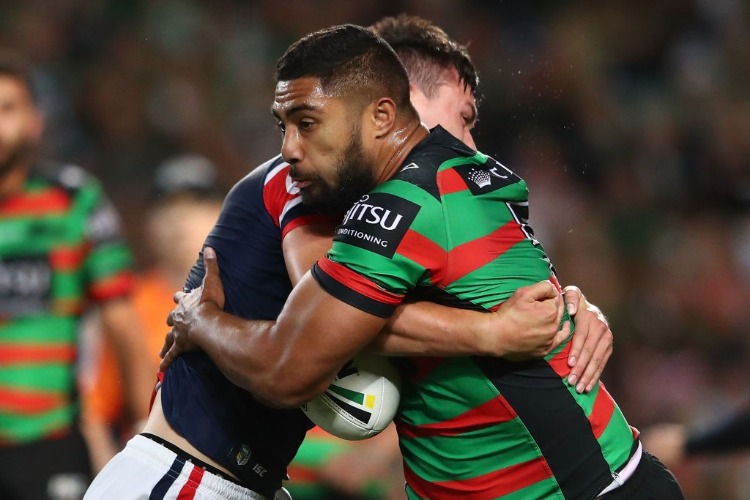 ROBERT JENNINGS of the Rabbitohs is tackled during the NRL Preliminary Final match between the Sydney Roosters and the South Sydney Rabbitohs at AS in Sydney, Australia.