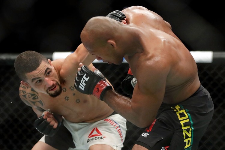 ROBERT WHITTAKER battles JACARE SOUZAQ during their Middleweight bout on UFC Fight Night at the Sprint Center in Kansas City, Missouri.
