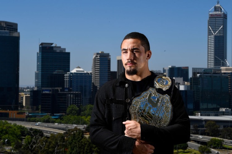 ROBERT WHITTAKER poses for a photo at Kings Park overlooking the Perth City skyline during a UFC 221 media opportunity in Perth, Australia.