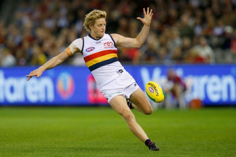 RORY SLOANE of the Crows kicks the ball during the AFL match between the St Kilda Saints and the Adelaide Crows at Etihad Stadium in Melbourne, Australia.