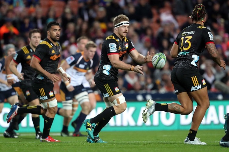 Chiefs SAM CANE runs the ball forward during the Super Rugby match between the Chiefs and the Brumbies at FMG Stadium Waikato in Hamilton, New Zealand.