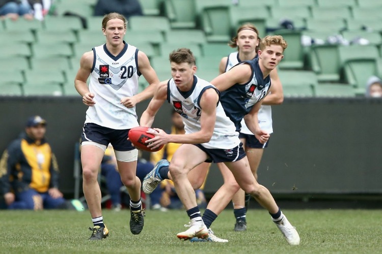 SAM WALSH of Vic Country runs during the U18 match between Vic Country and Vic Metro at Melbourne Cricket Ground in Melbourne, Australia.