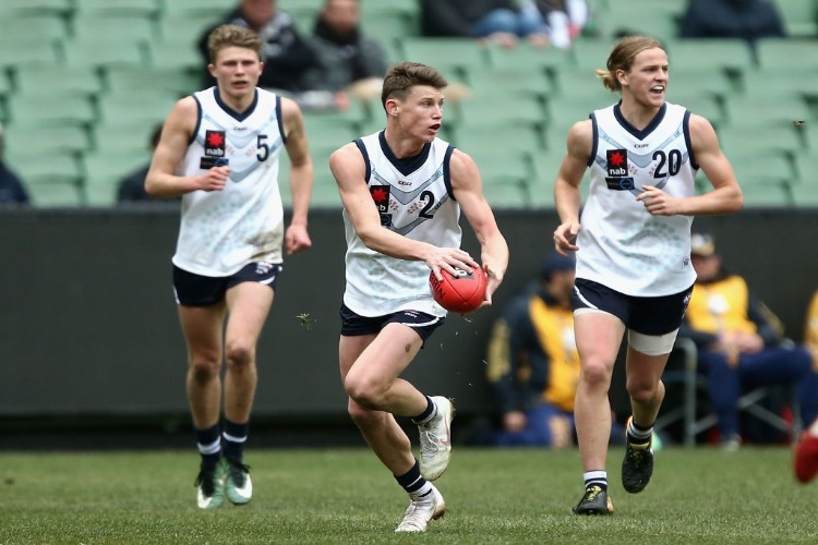 SAM WALSH of Vic Country runs during the U18 match between Vic Country and Vic Metro at MCG in Melbourne, Australia. SAM WALSH of Vic Country runs during the U18 match between Vic Country and Vic Metro at MCG in Melbourne, Australia.