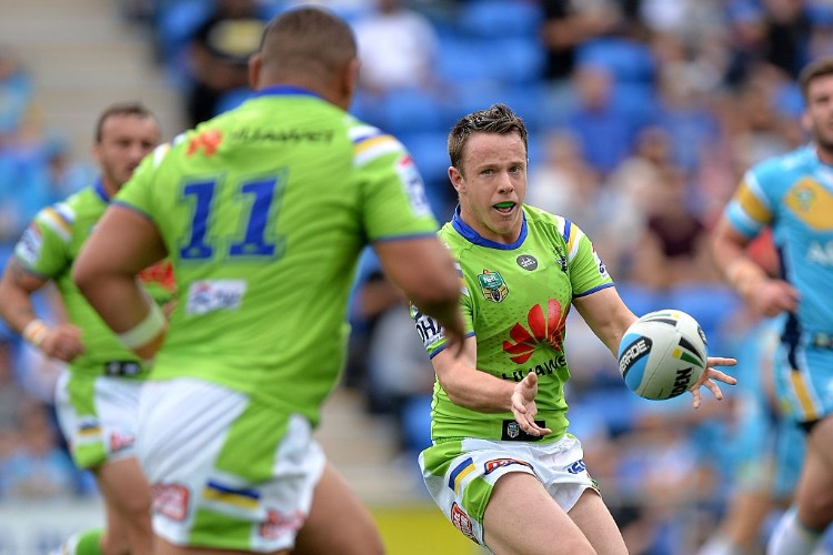 SAM WILLIAMS of the Raiders passes the ball during the NRL match between the Gold Coast Titans and the Canberra Raiders at Cbus Super Stadium in Gold Coast, Australia.