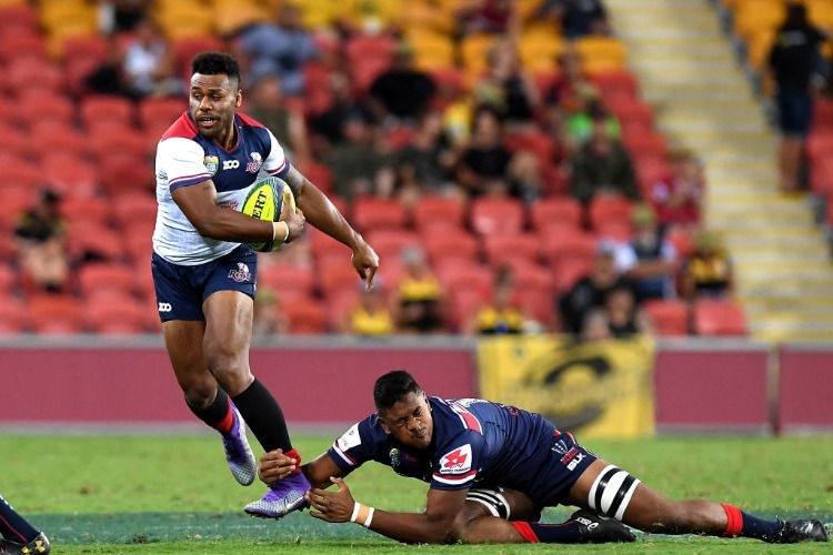 SAMU KEREVI of the Reds breaks away from the defence during the 2018 Global Tens match between the Queensland Reds and the Melbourne Rebels at Suncorp Stadium in Brisbane, Australia. SAMU KEREVI of the Reds breaks away from the defence during the 2018 Global Tens match between the Queensland Reds and the Melbourne Rebels at Suncorp Stadium in Brisbane, Australia.