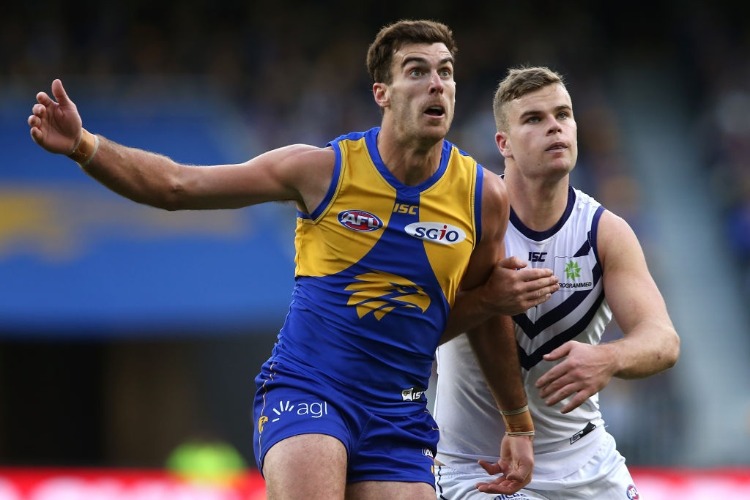 SCOTT LYCETT of the Eagles and Sean Darcy of the Dockers contest the ruck during the AFL match between the West Coast Eagles and the Fremantle Dockers at Optus Stadium in Perth, Australia.