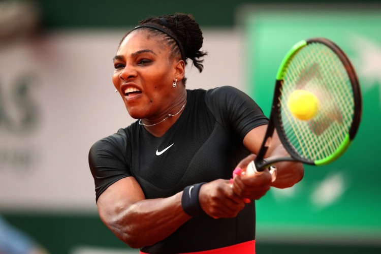 SERENA WILLIAMS of The United States plays a backhand during the ladies singles match against Julia Georges of Germany during the 2018 French Open at Roland Garros in Paris, France. SERENA WILLIAMS of The United States plays a backhand during the ladies singles match against Julia Georges of Germany during the 2018 French Open at Roland Garros in Paris, France.