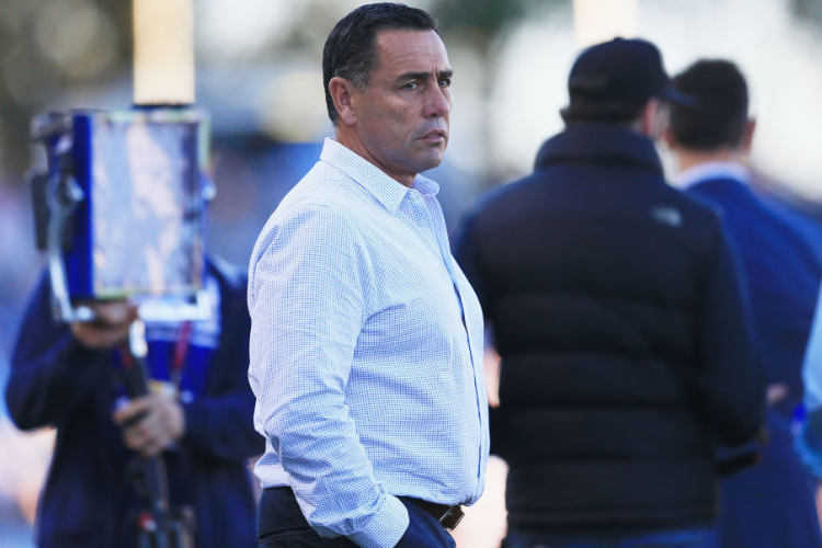 Sharks Coach SHANE FLANAGAN looks on before the NRL match between the Cronulla Sharks and the Canterbury Bulldogs at Southern Cross Group Stadium in Sydney, Australia. Sharks Coach SHANE FLANAGAN looks on before the NRL match between the Cronulla Sharks and the Canterbury Bulldogs at Southern Cross Group Stadium in Sydney, Australia.