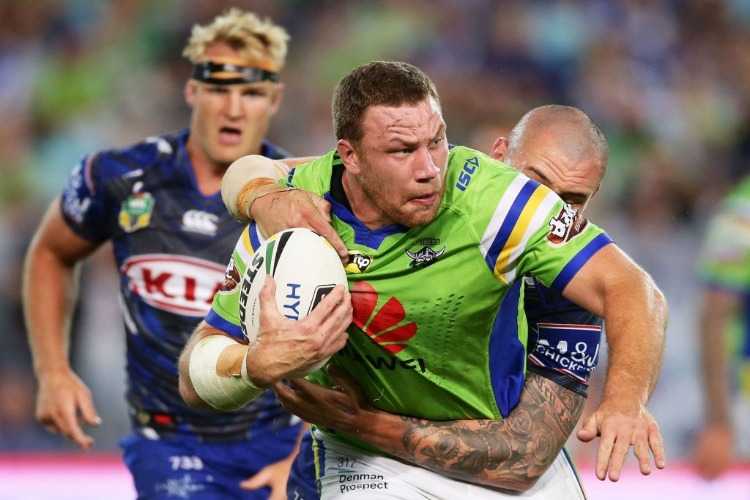 SHANNON BOYD of the Raiders is tackled during the NRL match between the Canterbury Bulldogs and the Canberra Raiders at ANZ Stadium in Sydney, Australia.