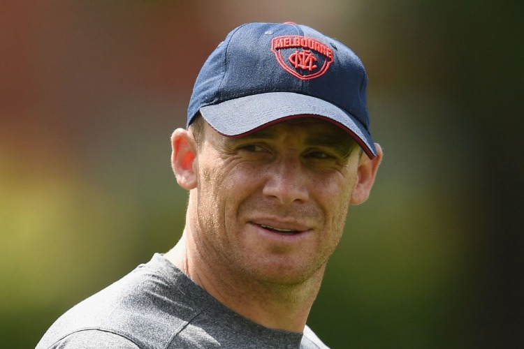 SIMON GOODWIN the coach of the Demons looks on during a Melbourne Demons AFL training session at Gosch's Paddock in Melbourne, Australia.