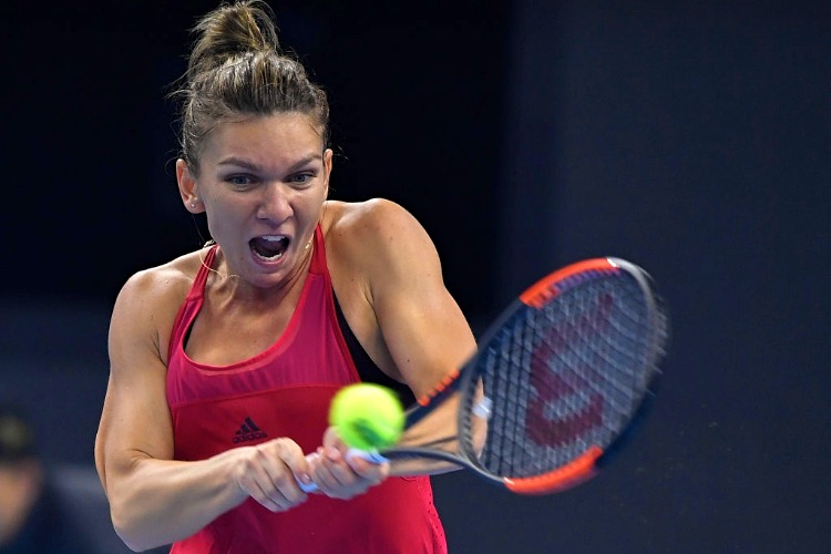 SIMONA HALEP of Romania in action against Caroline Garcia of France of the 2017 China Open at the China National Tennis Centre in Beijing, China.