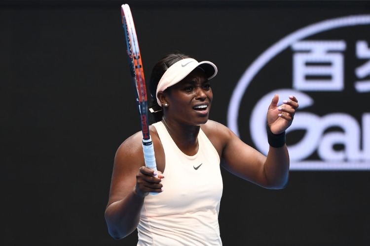 SLOANE STEPHENS of the United States reacts in her first round match against Shuai Zhang of China on day one of the 2018 Australian Open at Melbourne Park in Melbourne, Australia.