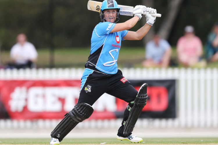 SOPHIE DEVINE of the Strikers bats during the Women's Big Bash League match between the Melbourne Renegades and the Adelaide Strikers at CitiPower Centre in Melbourne, Australia. SOPHIE DEVINE of the Strikers bats during the Women's Big Bash League match between the Melbourne Renegades and the Adelaide Strikers at CitiPower Centre in Melbourne, Australia.