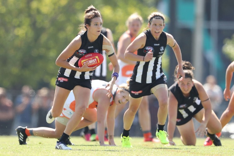 STEPH CHIOCCI of the Magpies runs with the ball during the AFL Women's match between the Collingwood Magpies and the Greater Western Sydney Giants at Olympic Park in Melbourne, Australia. STEPH CHIOCCI of the Magpies runs with the ball during the AFL Women's match between the Collingwood Magpies and the Greater Western Sydney Giants at Olympic Park in Melbourne, Australia.