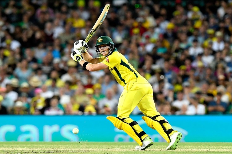 STEVE SMITH of Australia plays a shot during game three of the One Day International series between Australia and England at SCG in Sydney, Australia.