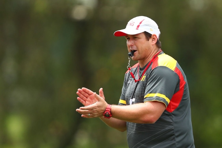 Senior coach STUART DEW during a Gold Coast Suns AFL training session at Metricon Stadium in Gold Coast, Australia.