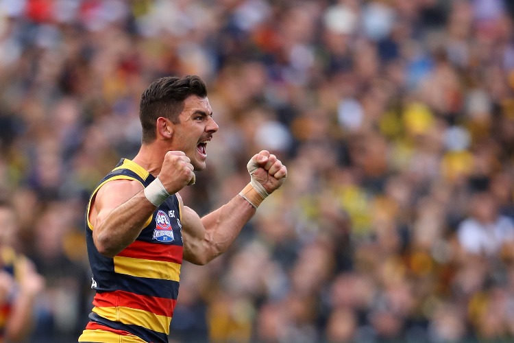 TAYLOR WALKER of the Crows celebrates kicking a goal during the 2017 AFL Grand Final match between the Adelaide Crows and the Richmond Tigers at MCG in Melbourne, Australia.