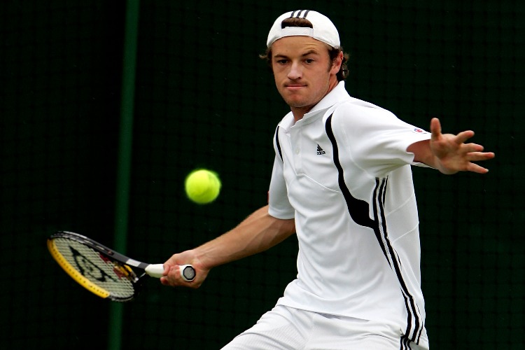 TODD REID of Australia in action during his first round match against Vincent Spadea of USA at the Wimbledon Lawn Tennis Championship at the All England Lawn Tennis and Croquet Club in London. TODD REID of Australia in action during his first round match against Vincent Spadea of USA at the Wimbledon Lawn Tennis Championship at the All England Lawn Tennis and Croquet Club in London.
