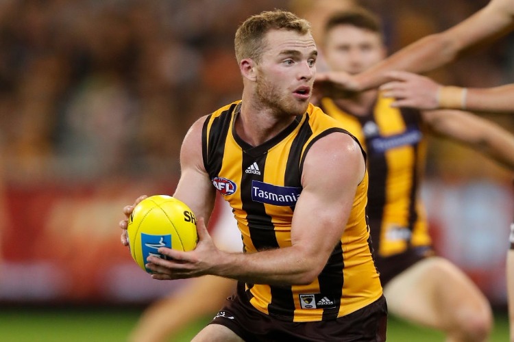TOM MITCHELL of the Hawks in action during the 2018 AFL match between the Hawthorn Hawks and the Collingwood Magpies at the MCG in Melbourne, Australia.