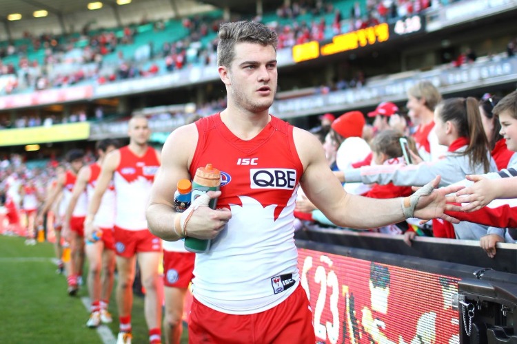 TOM PAPLEY of the Swans thanks fans after winning the AFL match between the Sydney Swans and the Fremantle Dockers at SCG in Sydney, Australia.