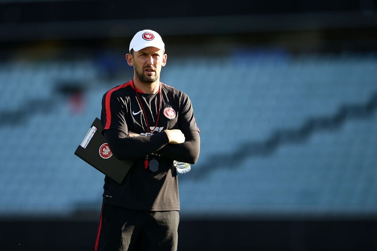 Wanderers coach TONY POPOVIC looks on during a Western Sydney Wanderers A-League training session at Pirtek Stadium in Sydney, Australia. Wanderers coach TONY POPOVIC looks on during a Western Sydney Wanderers A-League training session at Pirtek Stadium in Sydney, Australia.