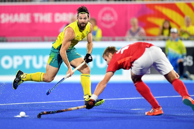 TRENT MITTON of Australia passes the ball in the semi final match between Australia and England during the Gold Coast 2018 Commonwealth Games at Gold Coast Hockey Centre in the Gold Coast, Australia.