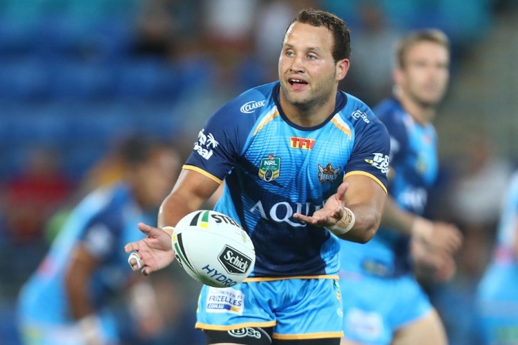 TYRONE ROBERTS of the Titans passes during the NRL match between the Gold Coast Titans and the Parramatta Eels at Cbus Super Stadium in Gold Coast, Australia.