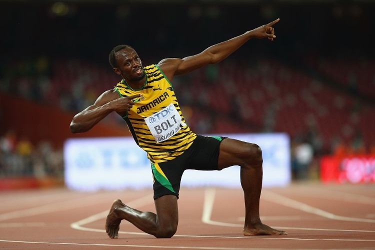 USAIN BOLT of Jamaica celebrates after winning gold in the Men's 200 metres final during the 15th IAAF World Athletics Championships Beijing 2015 at Beijing National Stadium in Beijing, China.