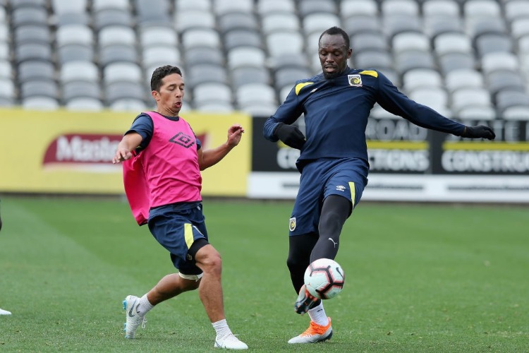 USAIN BOLT trains during a Central Coast Mariners training session at Central Coast Stadium in Gosford, Australia.