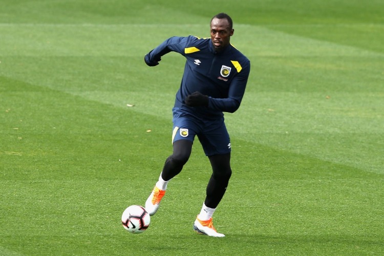 USAIN BOLT trains during a Central Coast Mariners training session at Central Coast Stadium in Gosford, Australia.