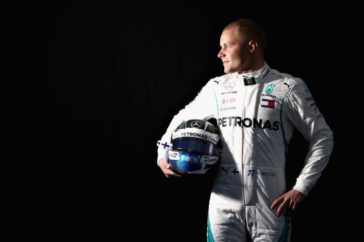 VALTTERI BOTTAS of Finland and Mercedes GP poses for a photo during previews ahead of the Australian Formula One Grand Prix at Albert Park in Melbourne, Australia.