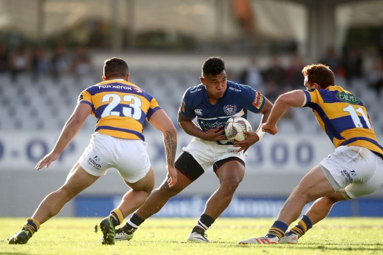 VINCE ASO of Auckland is tackled during the Mitre 10 Cup match between Auckland and Bay of Plenty in Auckland, New Zealand. VINCE ASO of Auckland is tackled during the Mitre 10 Cup match between Auckland and Bay of Plenty in Auckland, New Zealand.