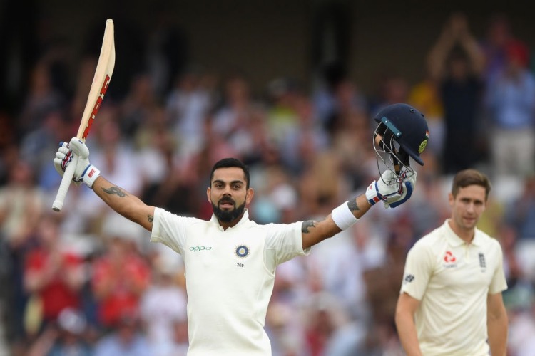 India batsman VIRAT KOHLI celebrates reaching his century during the 3rd Test Match between England and India in Nottingham, England.