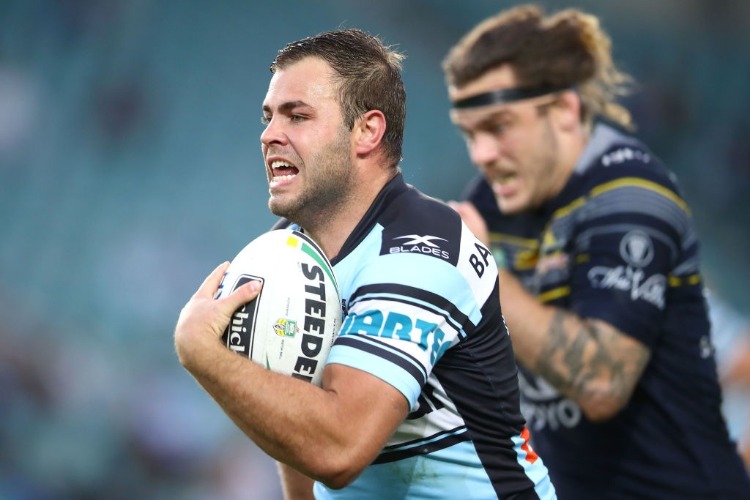 WADE GRAHAM of the Sharks makes a break during the NRL Elimination Final match between the Cronulla Sharks and the North Queensland Cowboys at Allianz Stadium in Sydney, Australia.