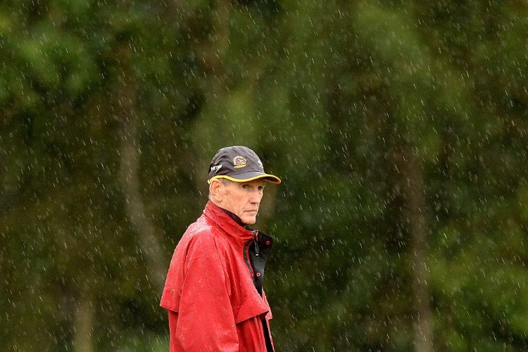 Coach WAYNE BENNETT watches on during the Brisbane Broncos NRL training session in Brisbane, Australia.