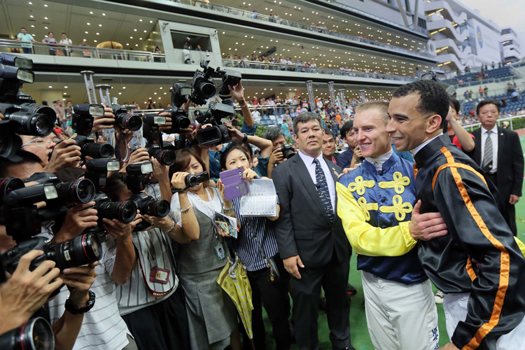 Riders Zac Purton and Joao Moreira congratulate each other after a hard-fought jockeys championship battle. Riders Zac Purton and Joao Moreira congratulate each other after a hard-fought jockeys championship battle.