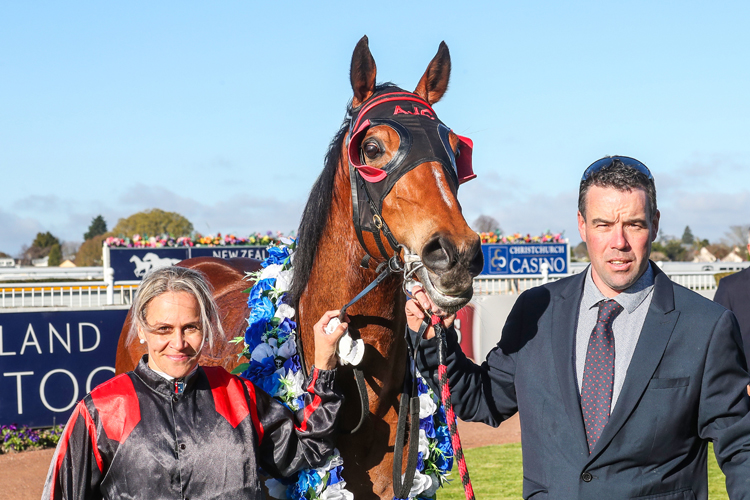 Miss Federer poses with trainer Andrew Carston and jockey Kylie Williams after her Riccarton victory