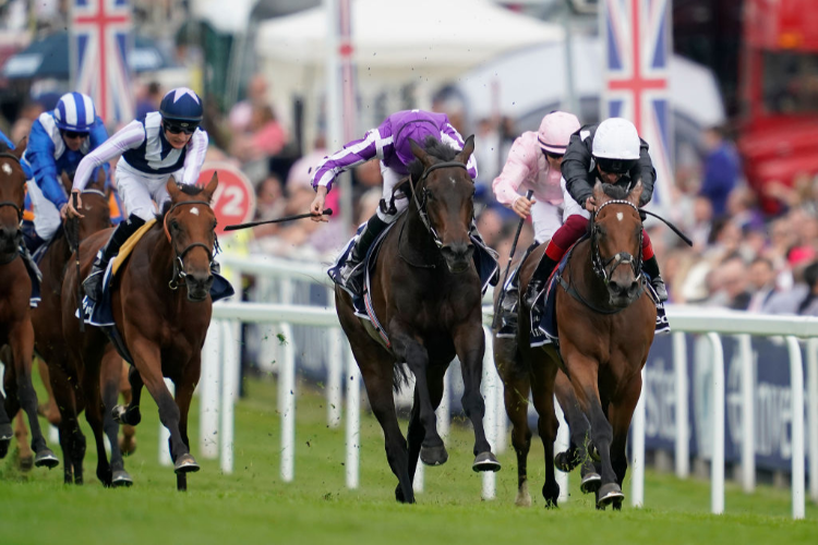 PINK DOGWOOD running in the Investec Oaks in Epsom, England.