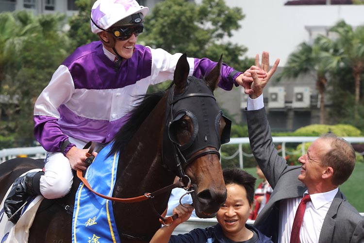 Chad Schofield and Richard Gibson celebrate Rattan's win. Chad Schofield and Richard Gibson celebrate Rattan's win.