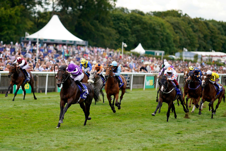 TEN SOVEREIGNS winning the Darley July Cup Stakes at Newmarket in England.