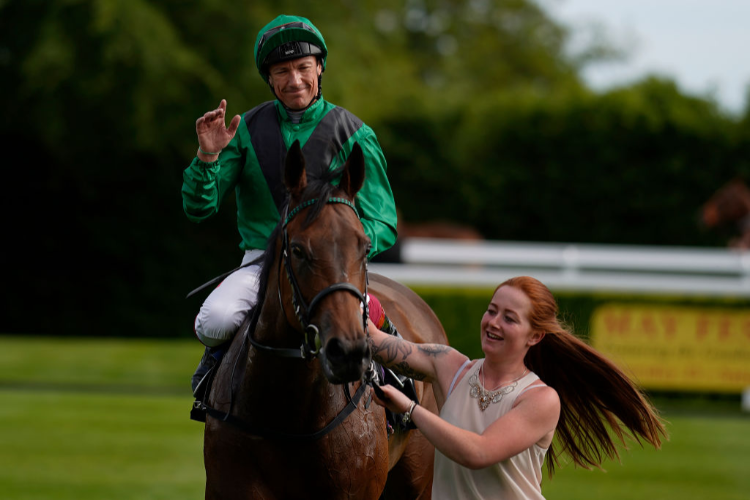 TEREBELLUM returns after winning the British European Breeders Fund Maiden Fillies Stakes at Goodwood in Chichester, England.