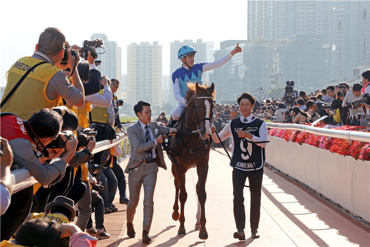 Jockey Christophe Soumillon after winning the Longines Hong Kong Mile at Sha Tin in Hong Kong.