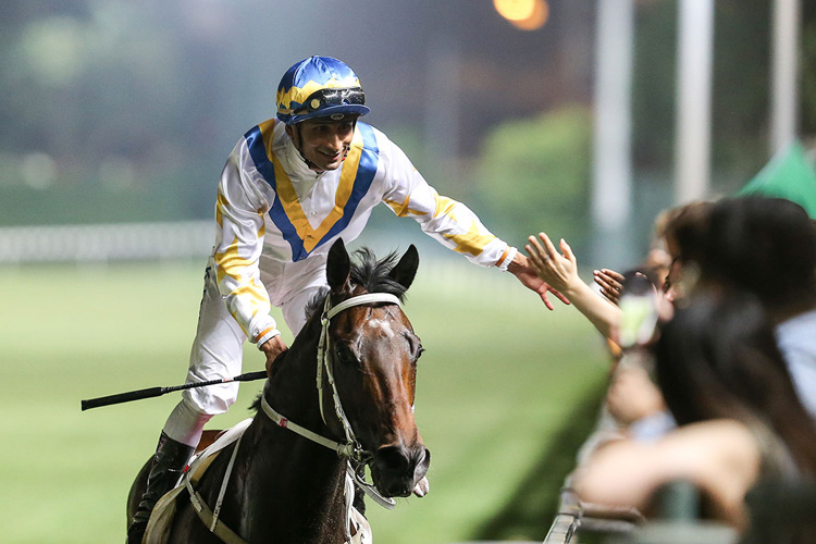 Karis Teetan celebrates victory on Hong Kong Bet. Karis Teetan celebrates victory on Hong Kong Bet.