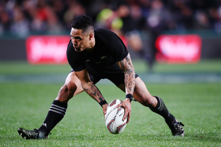 AARON SMITH of the All Blacks passes the ball out during the Rugby Championship match between the New Zealand All Blacks and the South African Springboks at QBE Stadium in Auckland, New Zealand.