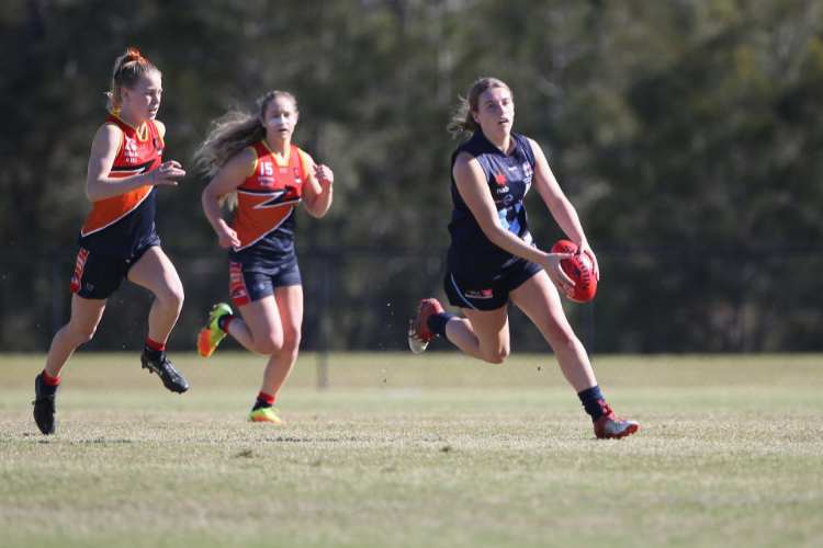 Vic Metro's Abbie Mckay in action during the AFLW U18 Championships match between Vic Metro v Central Allies at Bond University in Gold Coast, Australia.