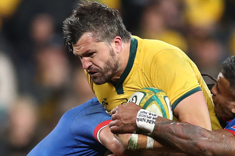 ADAM ASHLEY-COOPER of the Wallabies Is tackled during the International Test match between the Australian Wallabies and Manu Samoa at Bankwest Stadium in Sydney, Australia.