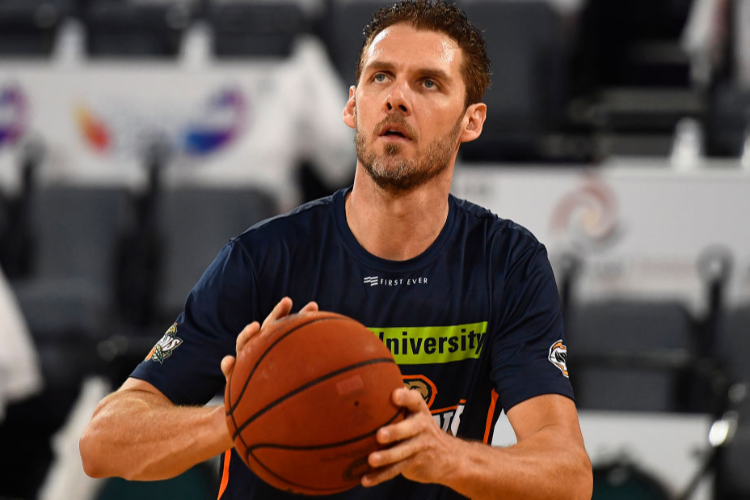 ALEX LOUGHTON of the Taipans warms up before the start of the NBL match between the Cairns Taipans and the Brisbane Bullets at Cairns Convention Centre in Cairns, Australia. ALEX LOUGHTON of the Taipans warms up before the start of the NBL match between the Cairns Taipans and the Brisbane Bullets at Cairns Convention Centre in Cairns, Australia.