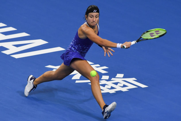 ANASTASIJA SEVASTOVA of Latvia returns a shot against Garbine Muguruza of Spain during their women's singles match on day 4 of the 2018 WTA Elite Trophy Zhuhai at Hengqin Tennis Center in Zhuhai, China. ANASTASIJA SEVASTOVA of Latvia returns a shot against Garbine Muguruza of Spain during their women's singles match on day 4 of the 2018 WTA Elite Trophy Zhuhai at Hengqin Tennis Center in Zhuhai, China.