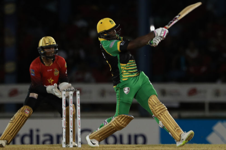 ANDRE RUSSELL of Jamaica Tallawahs hits six runs during the Hero Caribbean Premier League match between Trinbago Knight Riders and Jamaica Tallawahs at Queen's Park Oval in Port of Spain, Trinidad And Tobago.