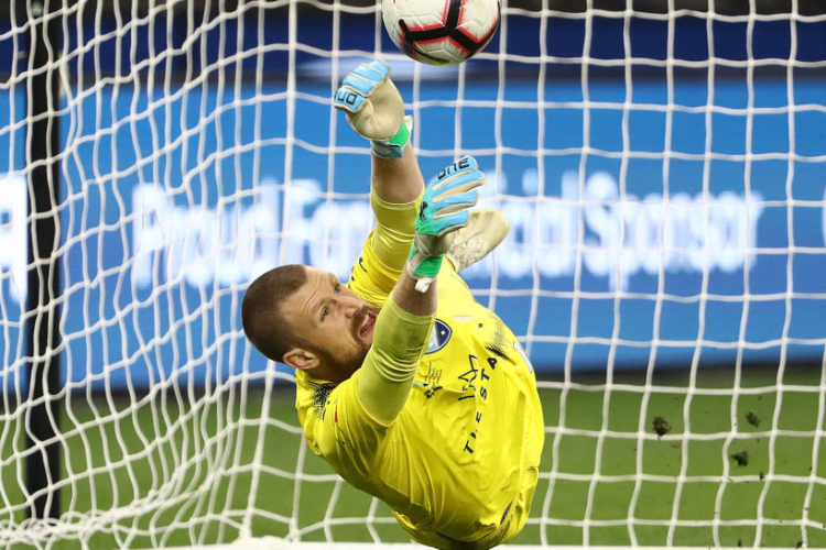 Sydney FC goalkeeper ANDREW REDMAYNE makes a save during the A-League Grand Final match between the Perth Glory and Sydney FC at Optus Stadium in Perth, Australia.